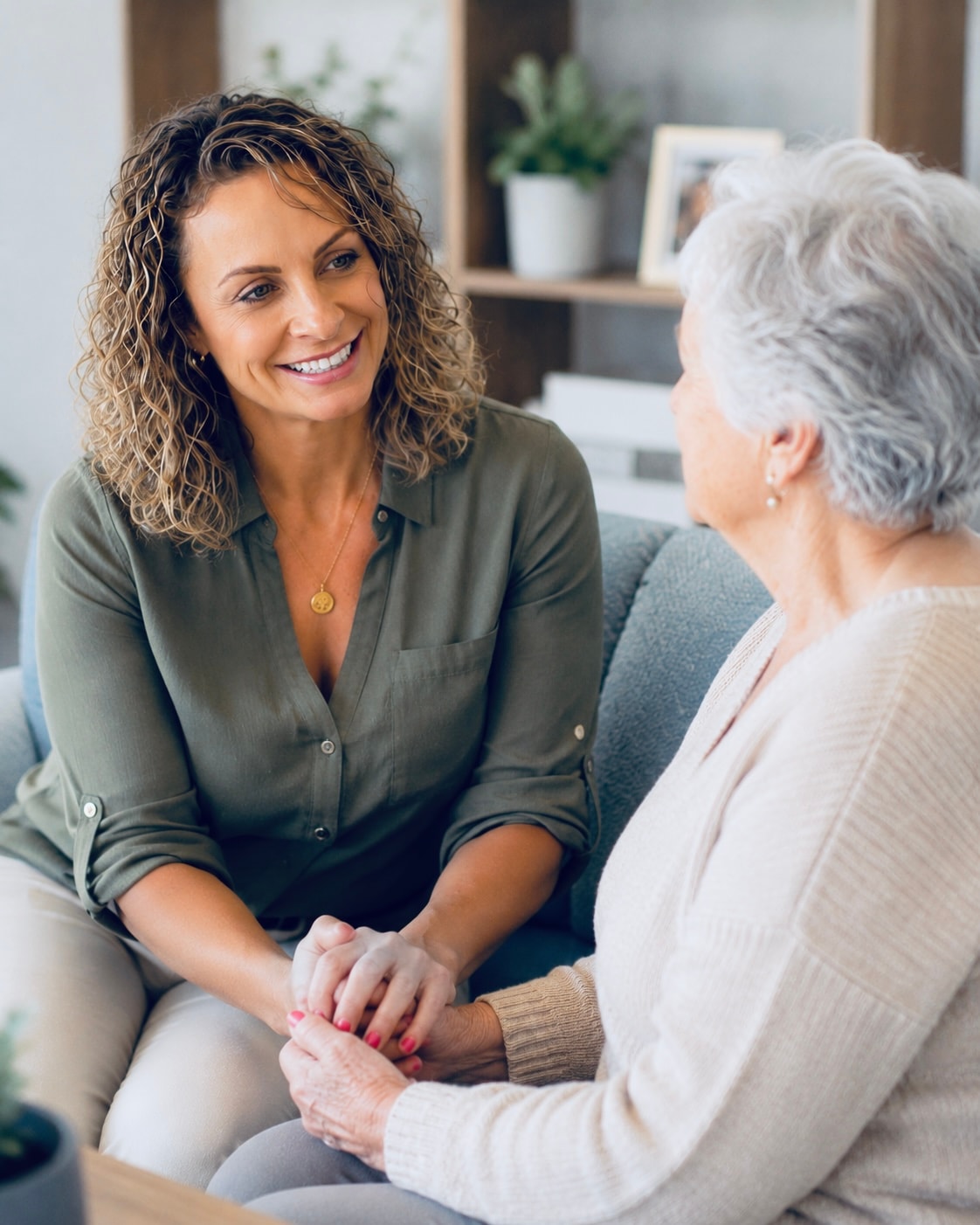 Tamara Burns speaking warmly with an elderly client
